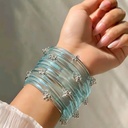 Elegance that shines with every move! These dreamy ice-blue charm bangles are the perfect blend of grace and style.